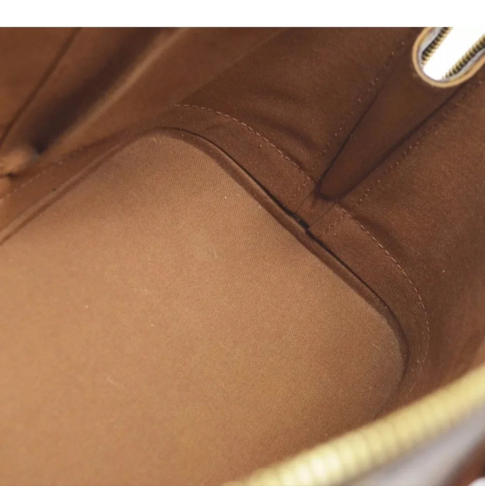 LOUIS VUITTON Alma Monogram Handbag - Picture 8 of 9